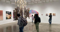 students enjoy art gallery faculty exhibition