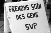 Photo avec une pancarte "Prenons soin des gens SVP"