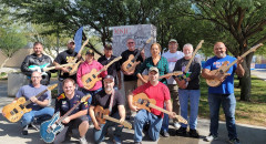 MSJC veterans holding guitars they built with Operation Twang